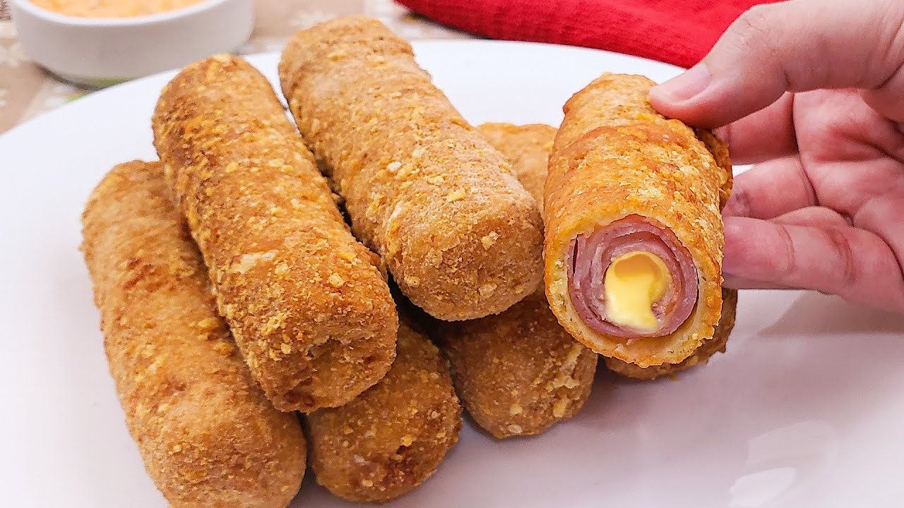 Receita de Enroladinho de Presunto e Queijo Assado que garanto ser melhor que o comprado em padaria!