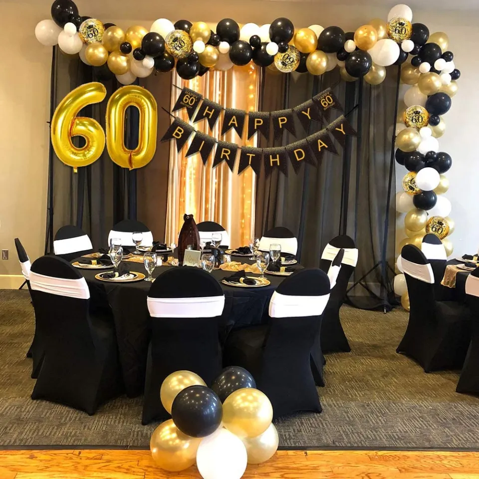 decoração de aniversário em preto, branco e dourado